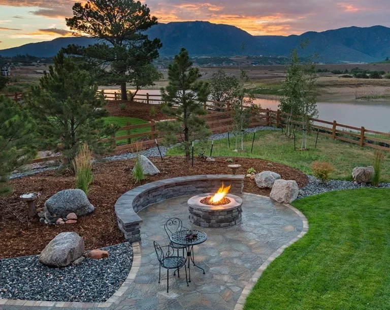 Cottage landscaping with mountain view sunset & lake