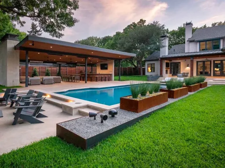 Modern backyard with inground pool, outdoor kitchen, entertaining space & patio