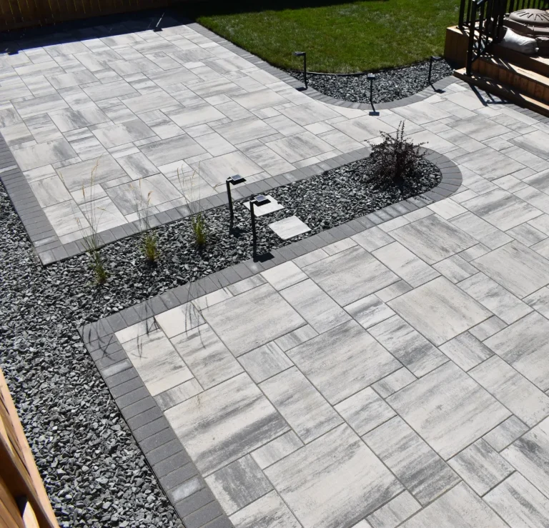 Winnipeg Landscaping Installation - Barkman Broadway Pavers With Border & Black Granite Decorative Rock